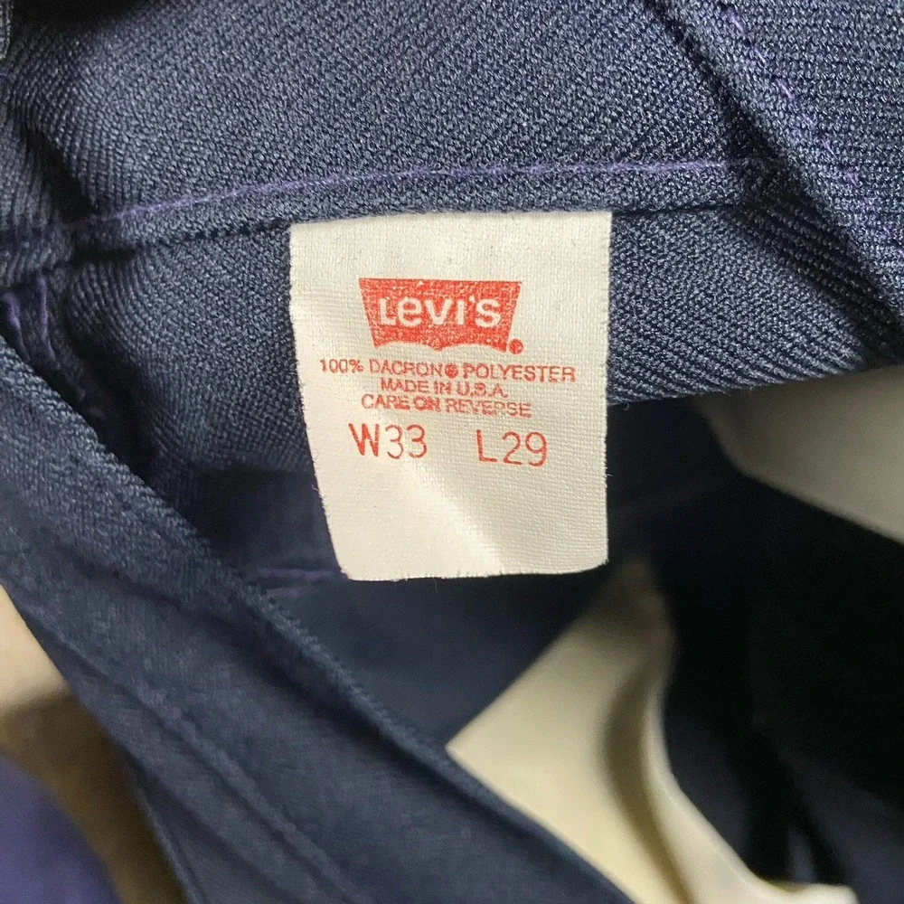Vintage 90s Levi's Action Slacks Size 33x29 Navy Blue Pleated Black Tab